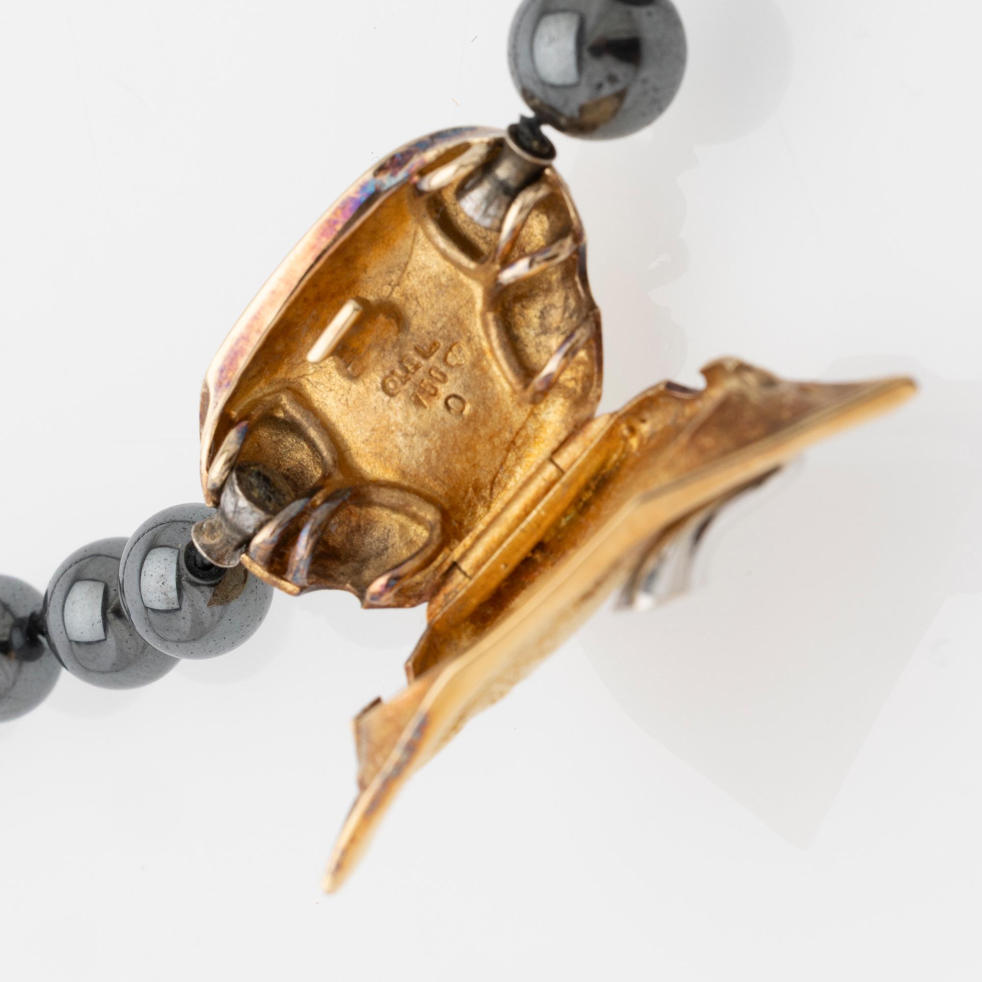 Ole Lynggaard, Hematite necklace with an 18K gold clasp and a diamond.