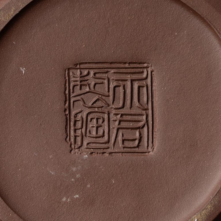 A group of three Chinese yixing teapots, 1960-80s.