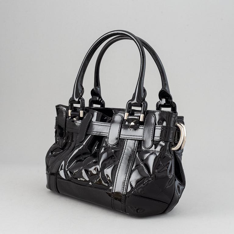 Burberry, a patent leather handbag.