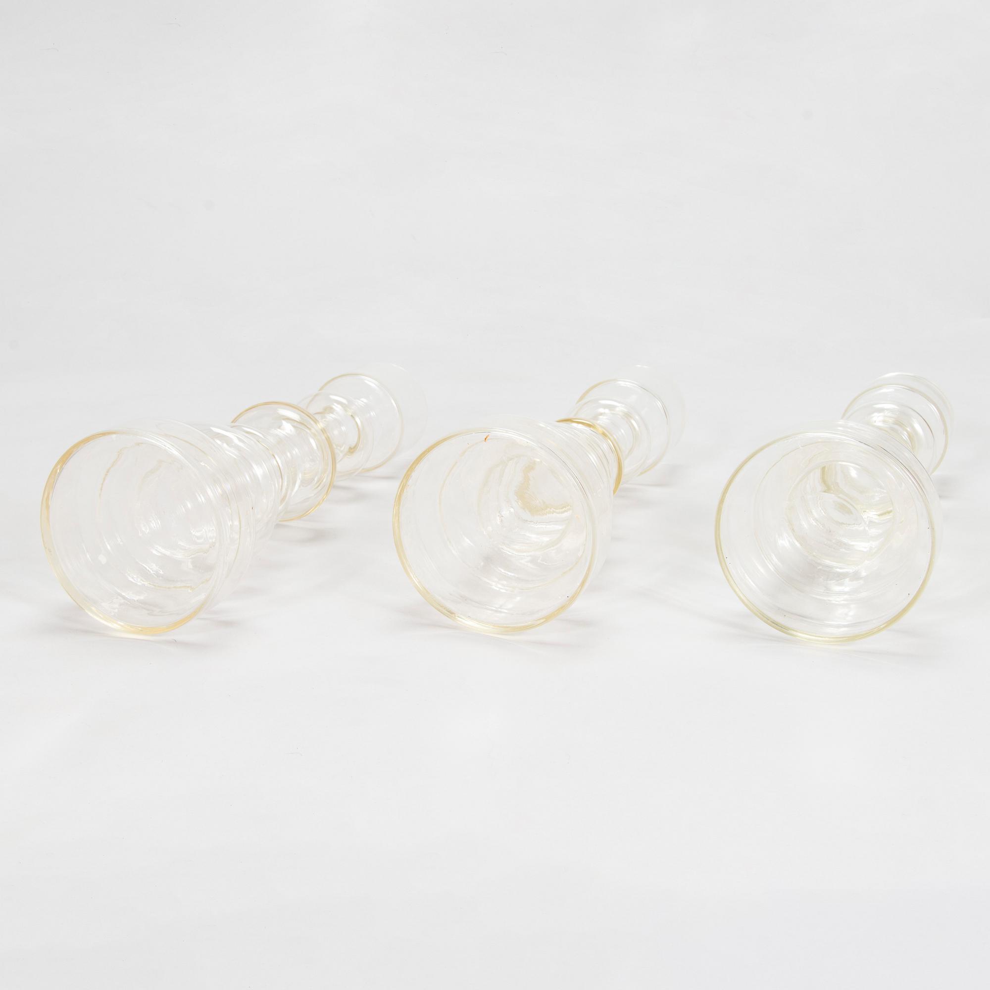Oiva Toikka, Three 'Lighthouse' glass candle holders / vases, two signed Notsjö Nuutajärvi.