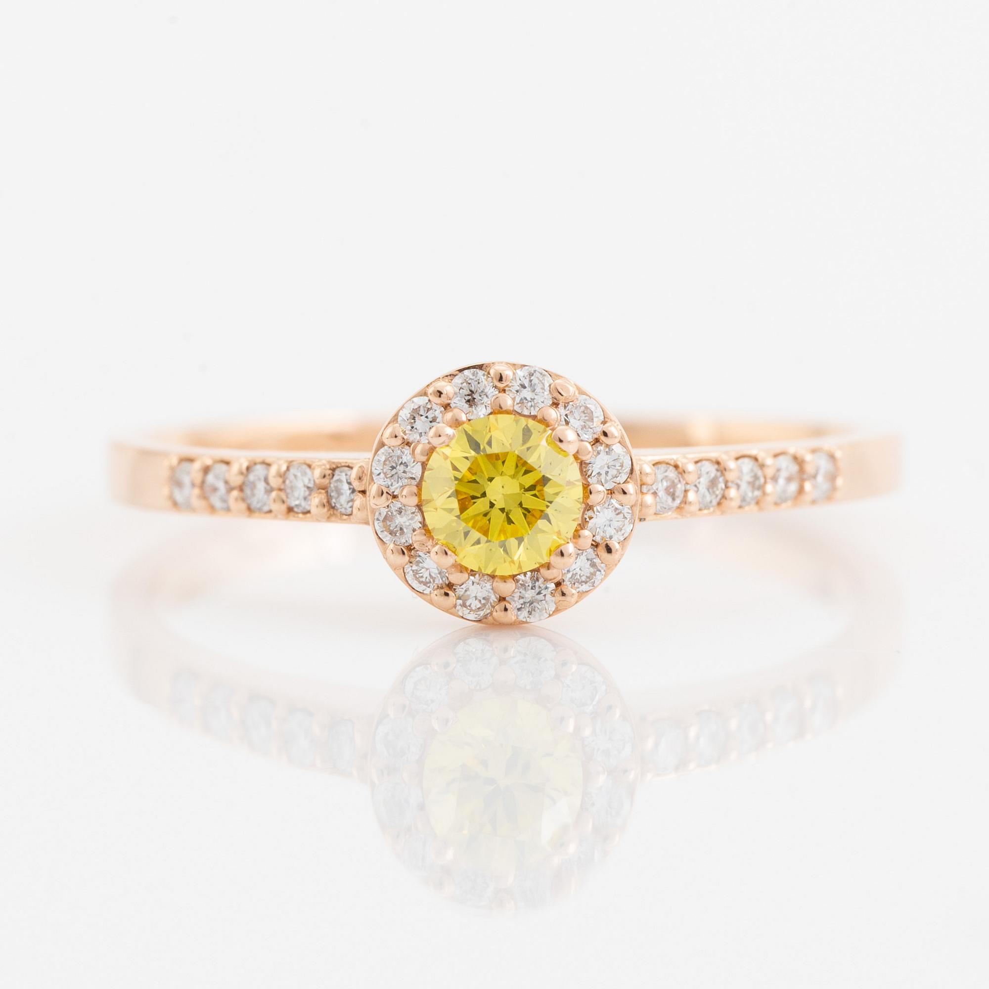 Brilliant cut colour treated yellow diamond ring.