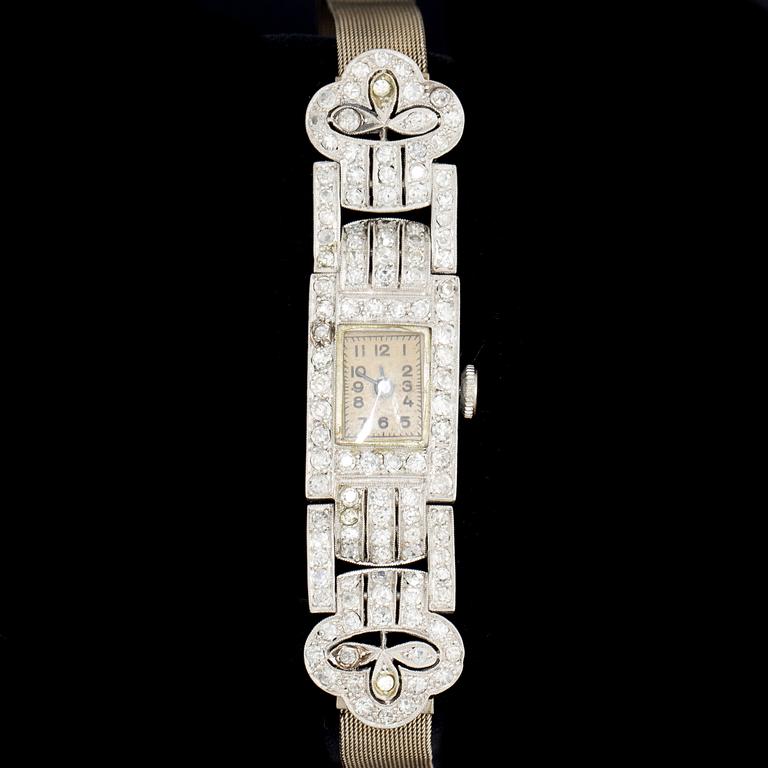 DAMARMBANDSUR, art deco, diamanter ca 1ct, vitguld. 1900-talets första hälft. Vikt ca 30g.