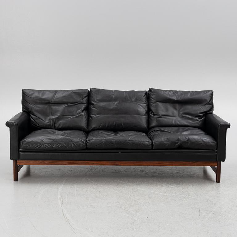 Two leather upholstered sofas and an armchair, IKEA, Sweden, 1960's/70's.