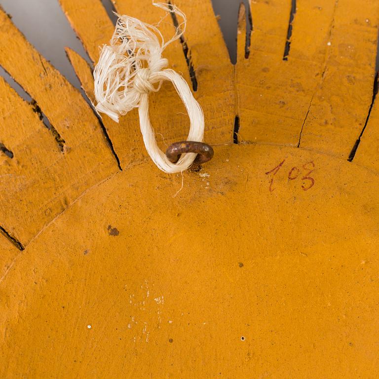 A mirror in shape of a sun, second half of the 20th century.