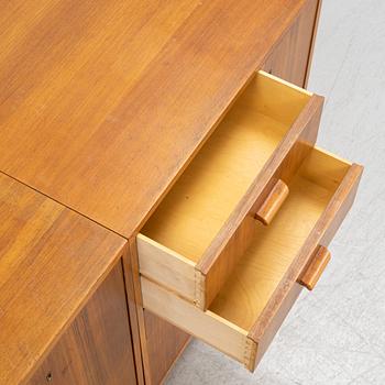 A mahogany, walnut and rosewood veneer set of cabinets with desk, Jönköping Möbelfabriks Aktiebolag. 1950's.