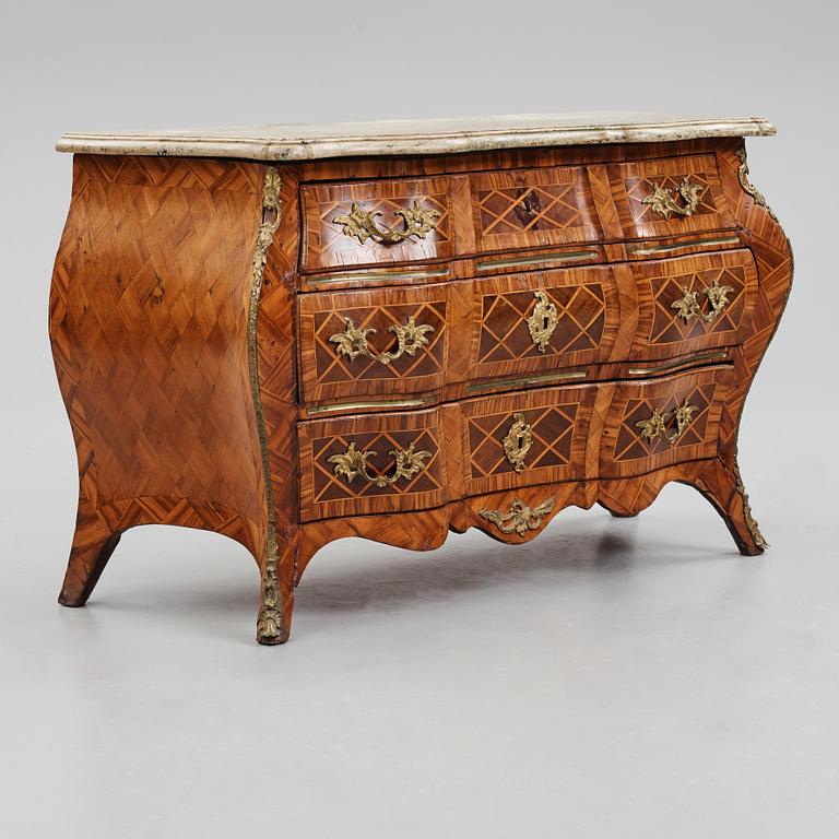 A Swedish Rococo 18th century commode presumably by Christian Linning, master 1744-1779.