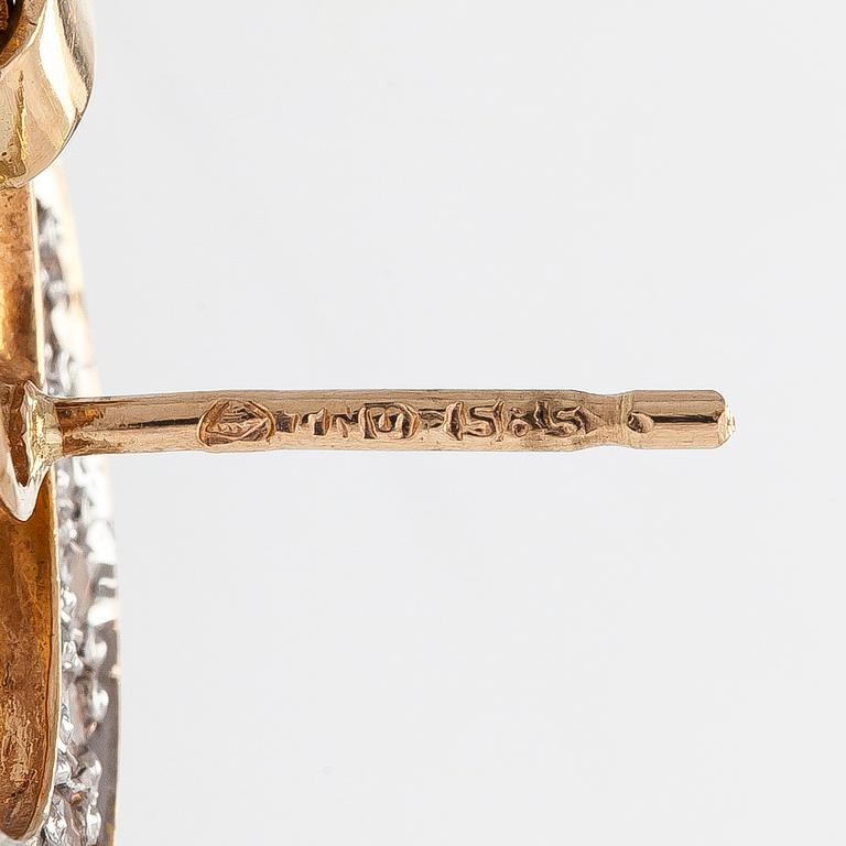 A pair of 14K gold earrings, with diamonds totalling approx. Finnish hallmarks.