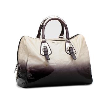 682. PRADA, a patent white and blue bag.