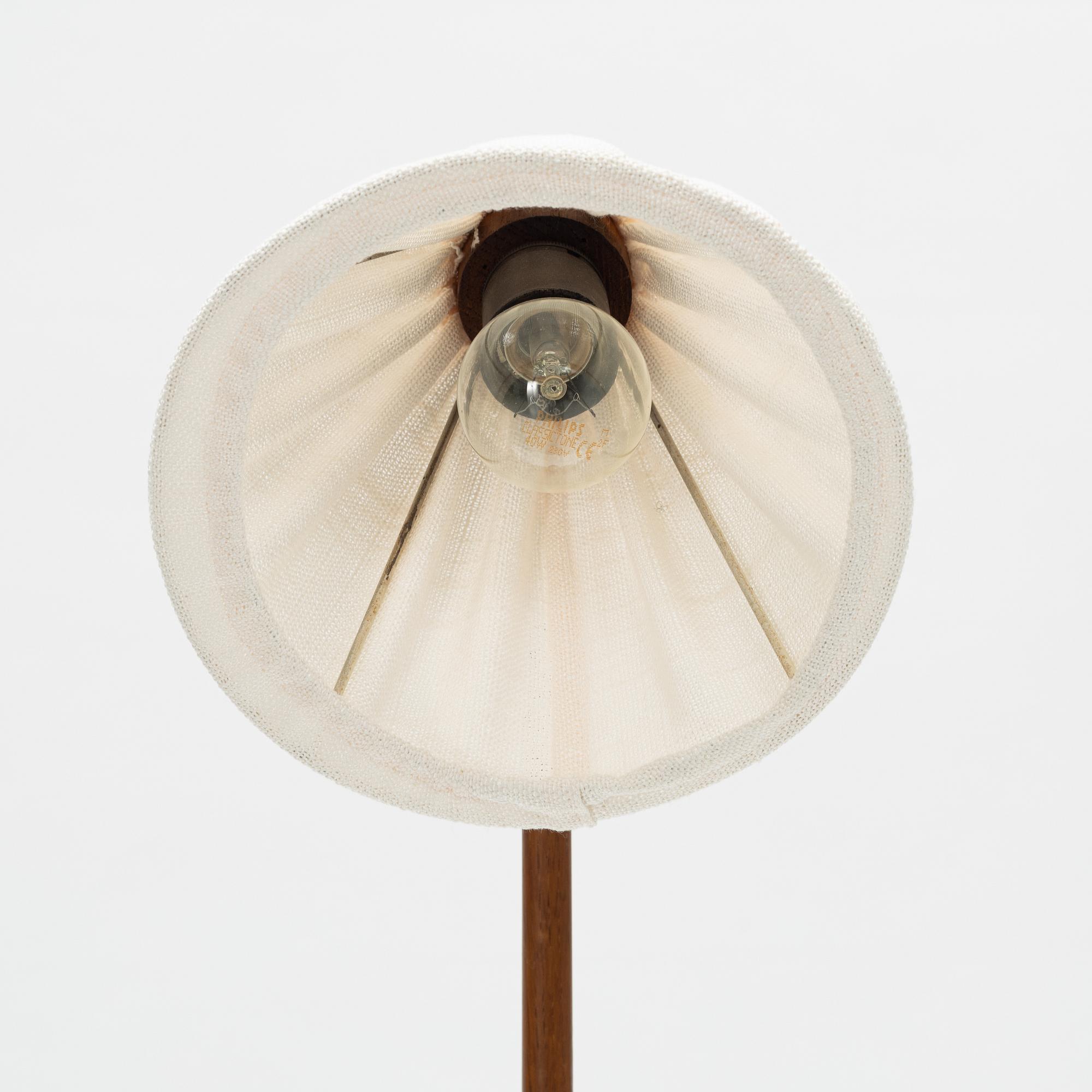 Uno & Östen Kristiansson, an oak floor light, Luxus, Vittsjö, Sweden, mid 20th Century.