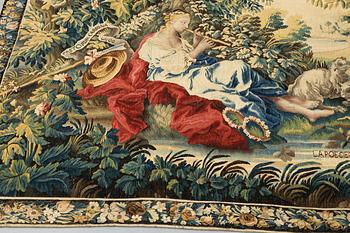 A tapestry, “La poesie pastoral”, tapestry weave, ca 251,5 x 283 cm, after Boucher, France 18th century.