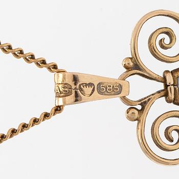 A 14K gold and synthetic spinel necklace. Salonius, Helsinki.