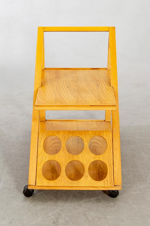 An Italian oak trolley later part of the 20th century.
