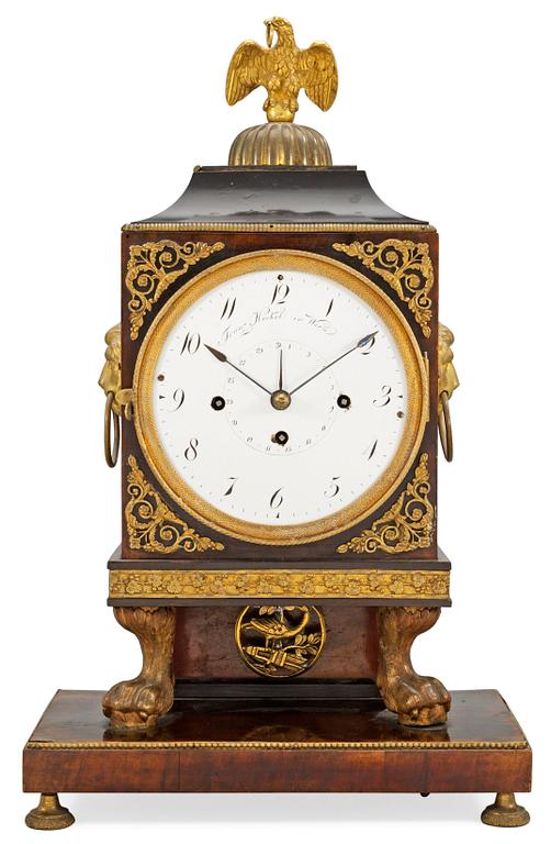 An Austrian Empire mantel clock.