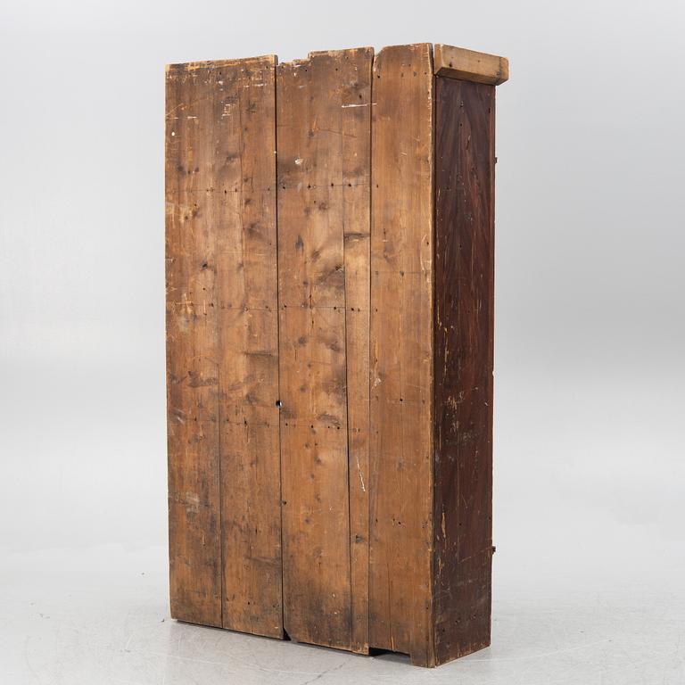 A Swedish wooden cabinet, 19th century.