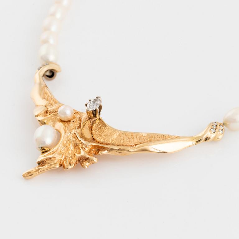 Cultured freshwater pearl necklace, with navette cut diamond and brilliant cut diamonds.