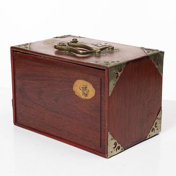 A Mahjong game in a hardwood box, China, first half of the 20th century.