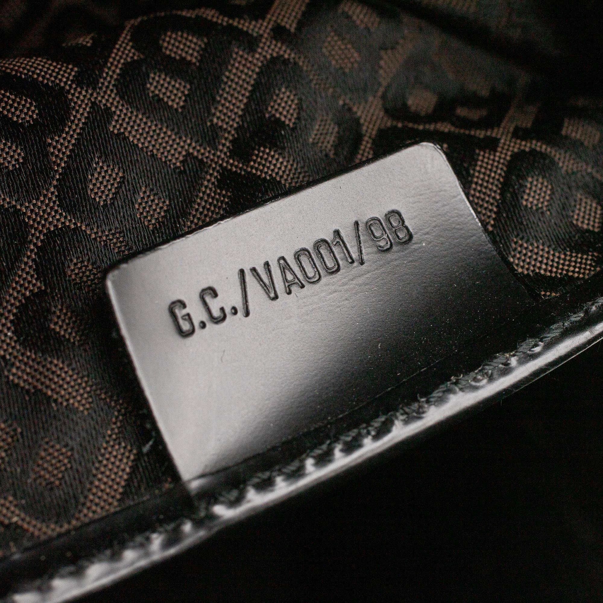 Bally, a black leather bag.