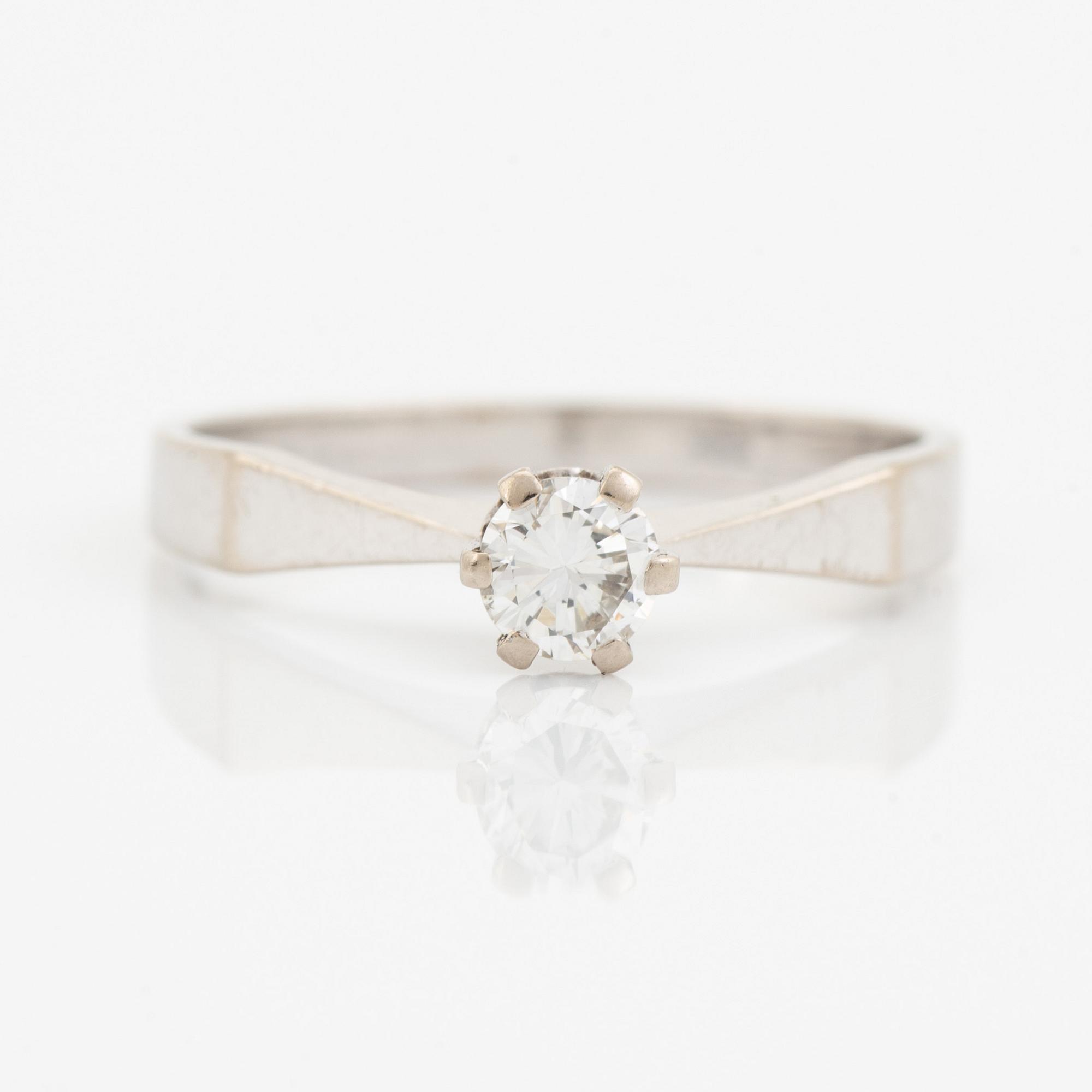 Brilliant cut diamond ring.