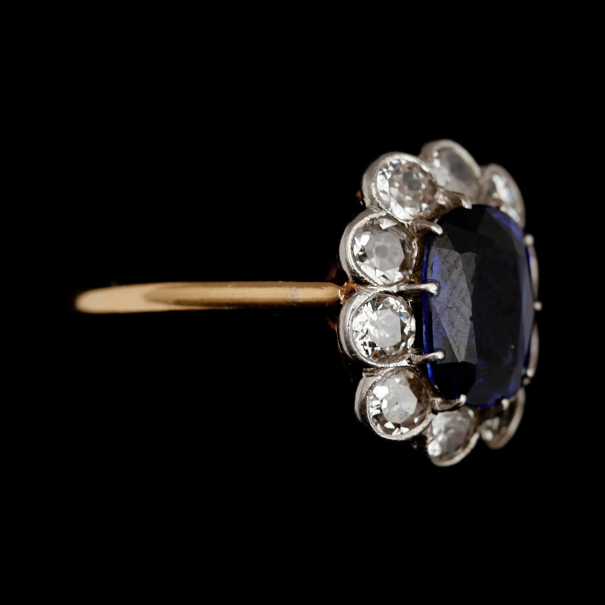 RING, 18 k guld, 10 briljanter totalt 0.90 ct samt syntetisk safir.