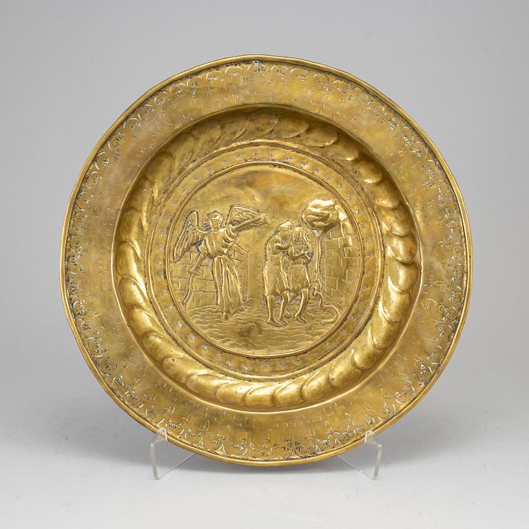 A renaissance style brass dish, late 19th century.