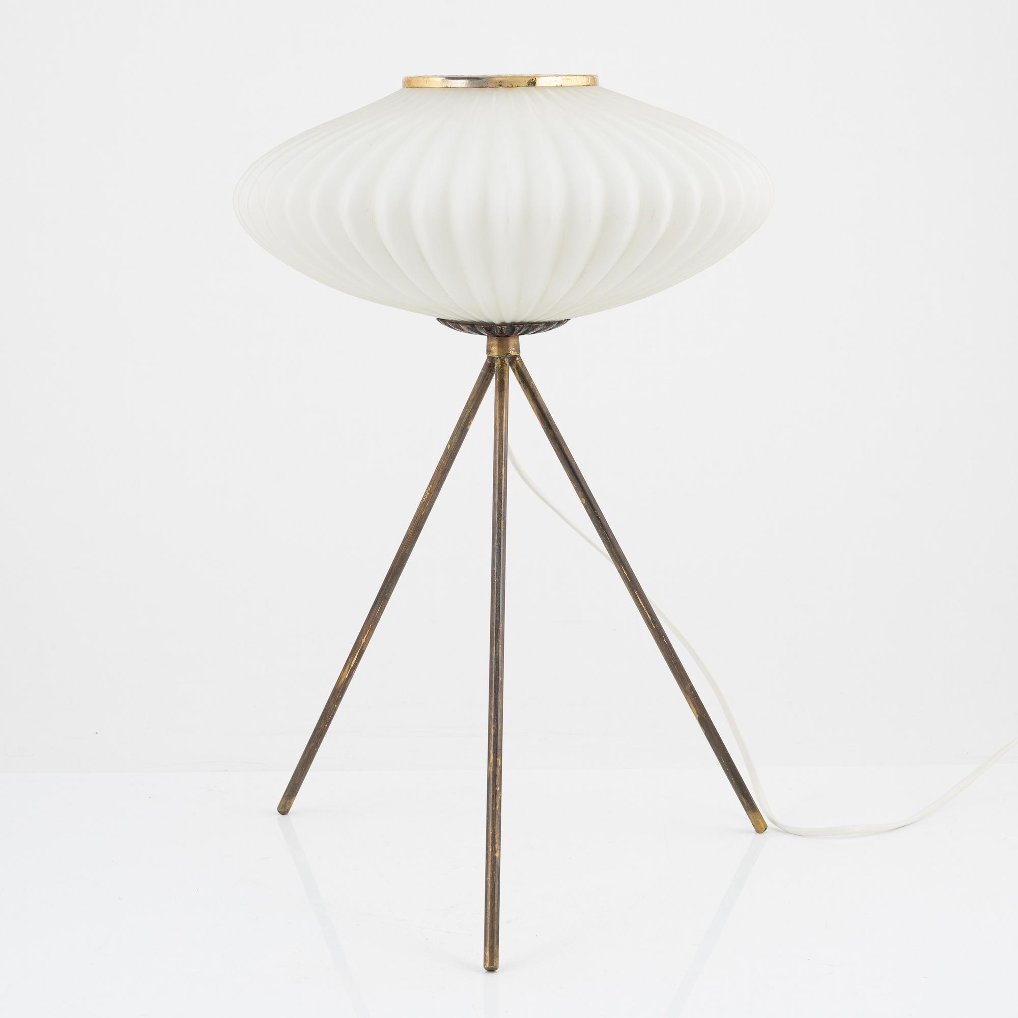 A glass and metal table lamp, probably Italy, 1960s.