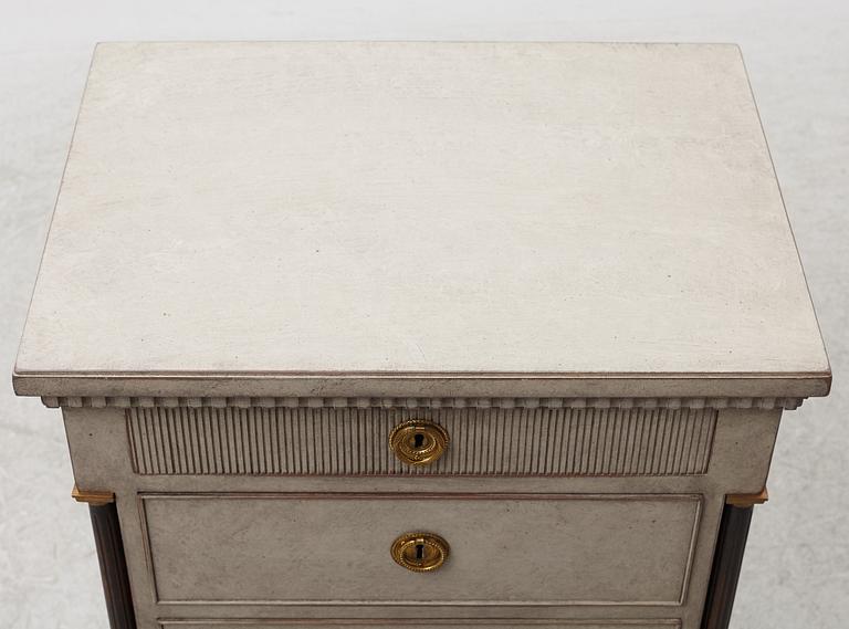 A chest of drawers, circa 1900.