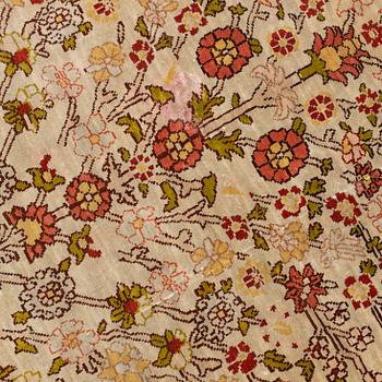 A Hereke silk rug, c. 130 x 87 cm.