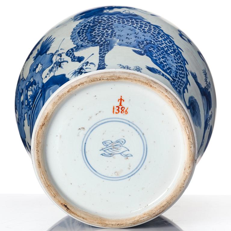 A Transtional blue and white baluster jar with cover, 17th Century.