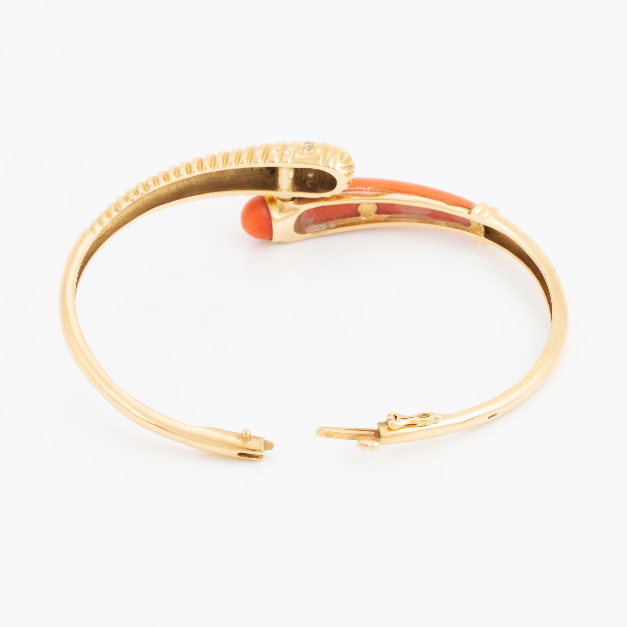 Gold and coral and diamond bangle.