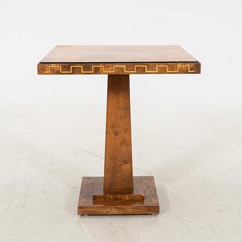 An Art Deco table dated 1940.