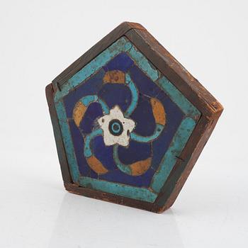 A glazed earthenware tile, Qajar dynasty Persia (Iran), 19th Century.