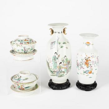 A set of two Chinese famille rose vases and two cups with covers and stands, late Qing dynasty/early 20th Century.