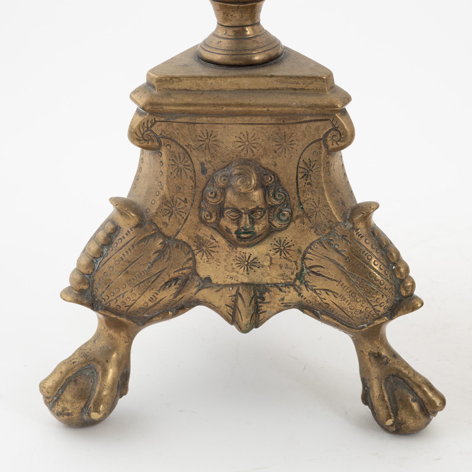 A pair of Baroque-style bronze candlesticks, 19th Century.