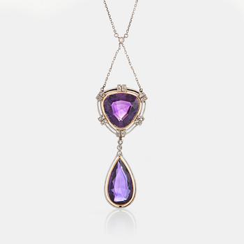 A pendant set with amethysts and rose-cut diamonds.