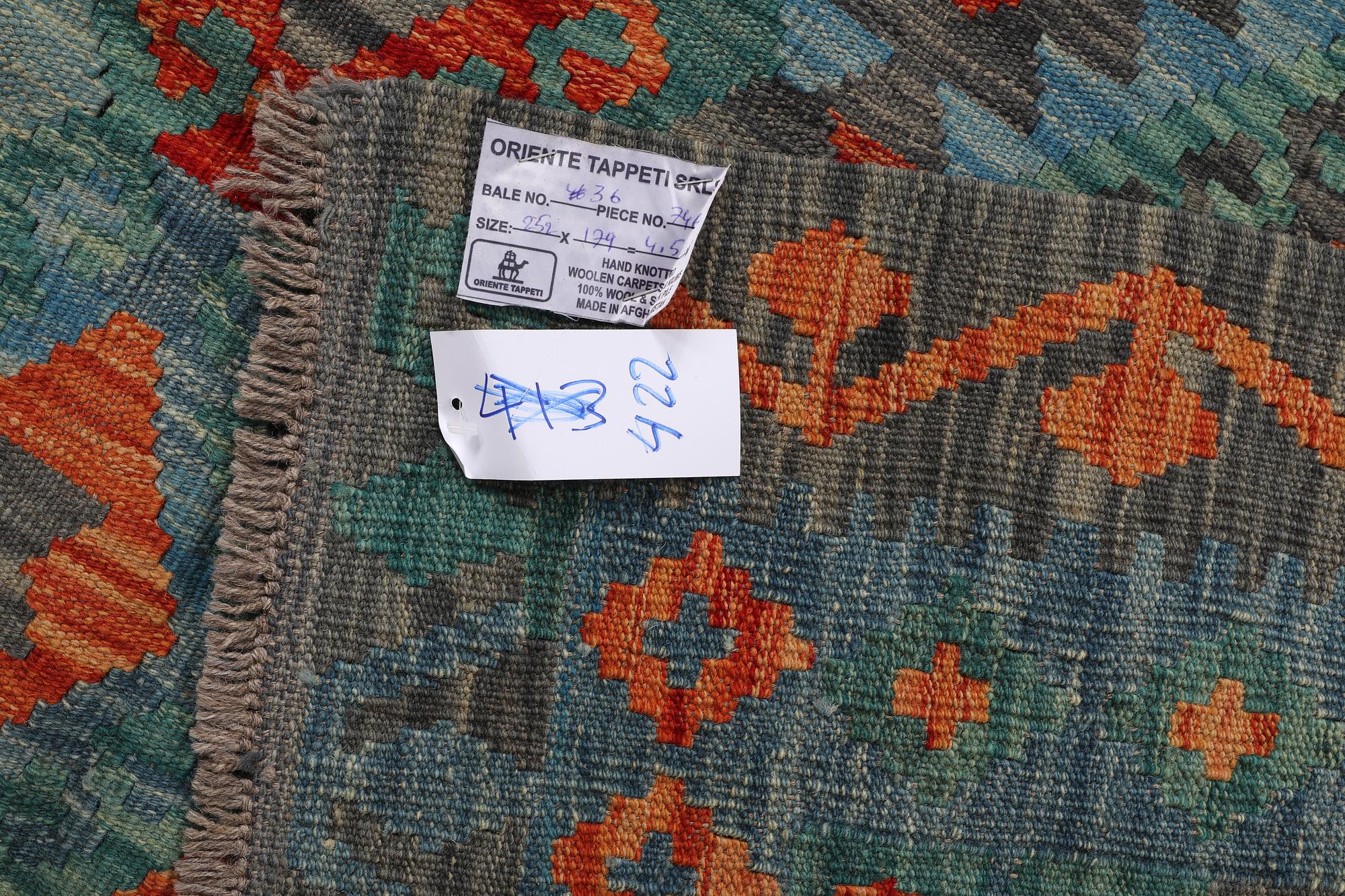 A rug, kilim, ca 252 x 179 cm.