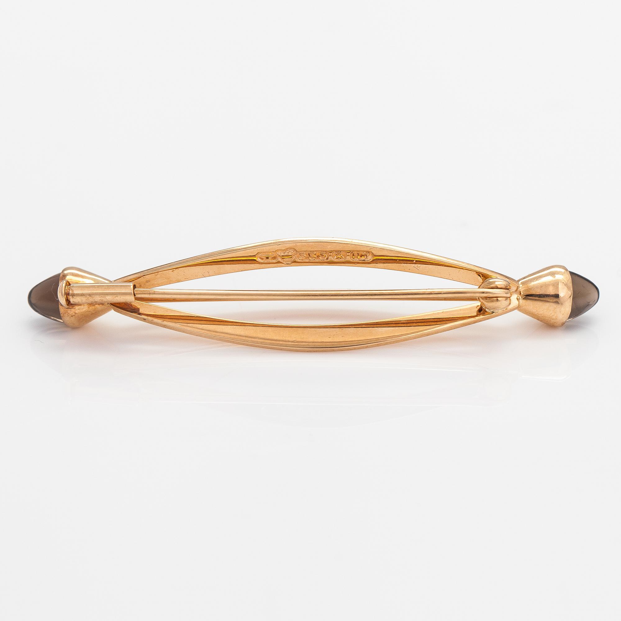 Elis Kauppi, A 14K gold brooch with smoky quartzes. Kupittaan kulta, Turku 1961.