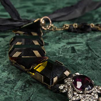 A necklace by LANVIN.