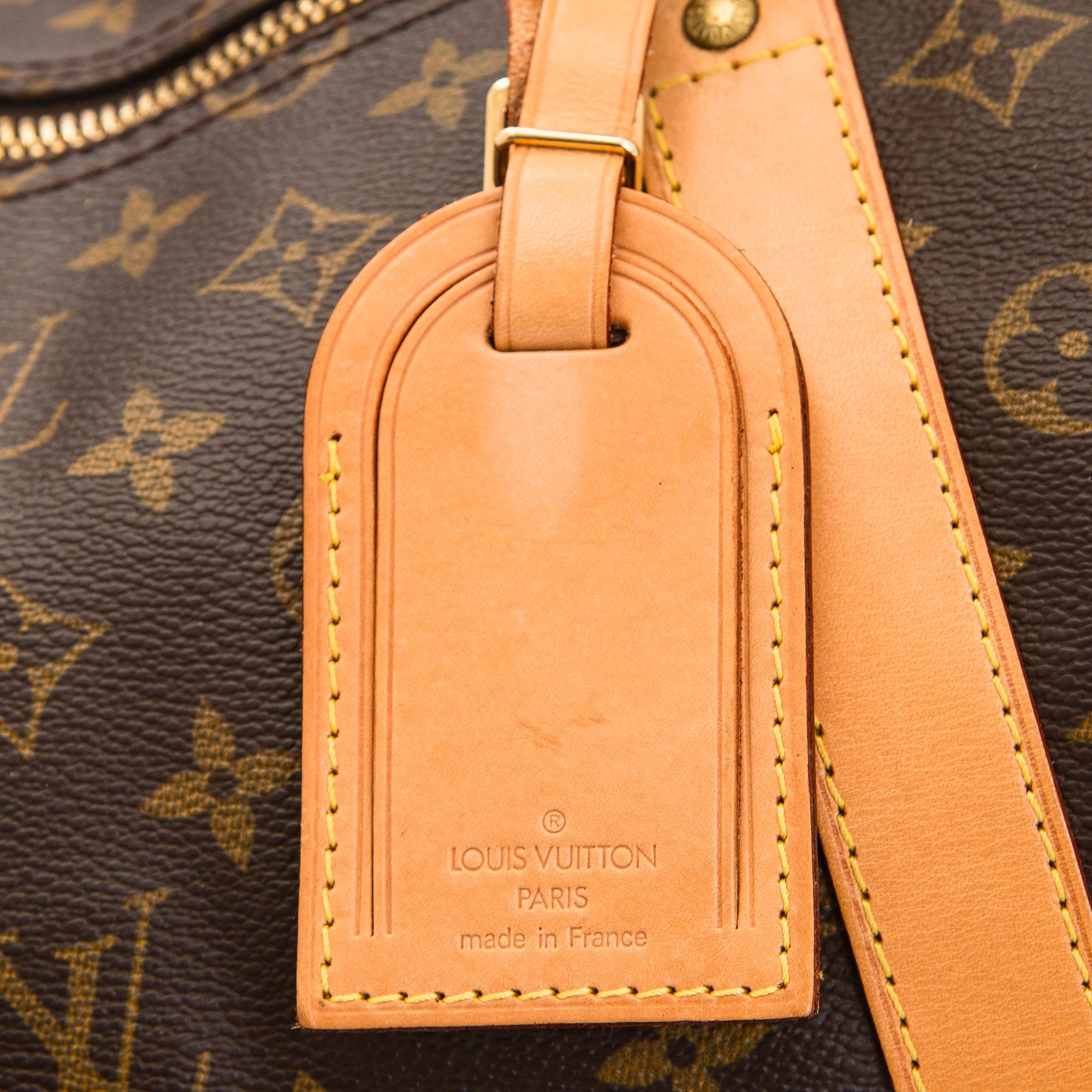 Louis Vuitton, a Monogram Canvas 'Keepall 55 Bandoulière' weekend bag.