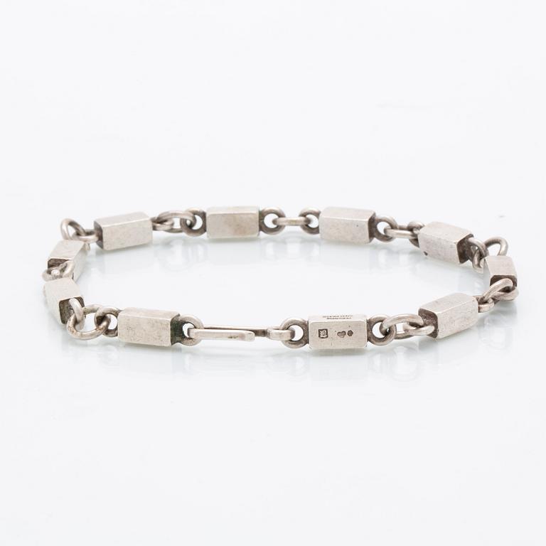 A Swedish sterling sivler bracelet mark of Wiwen Nilsson Lund 1962 length 24 cm, weight 347 grams,