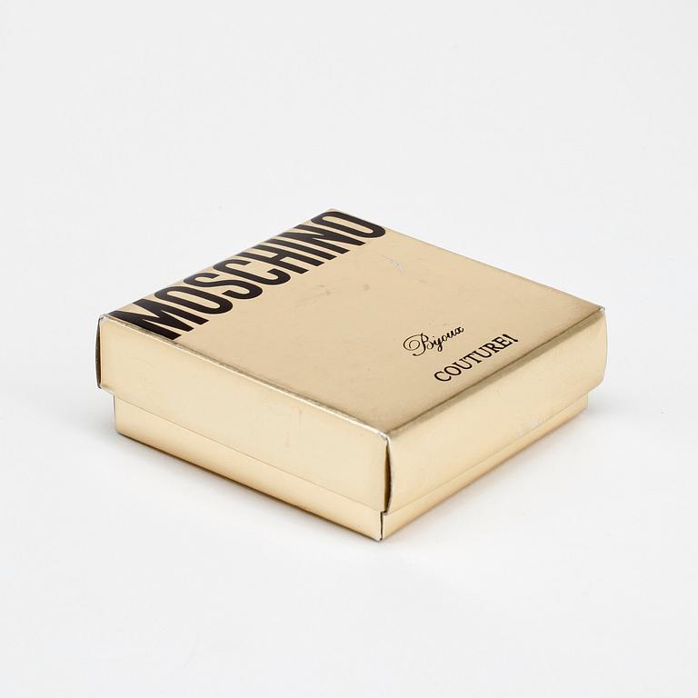 MOSCHINO, ett par örhängen.