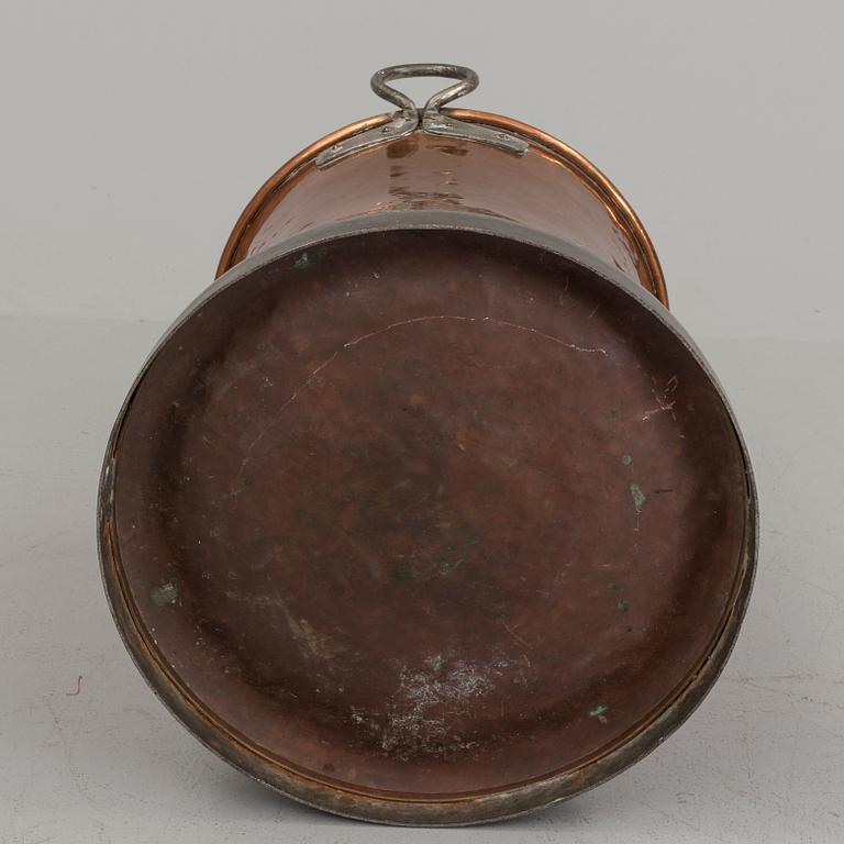 A 19th century copper barrel.