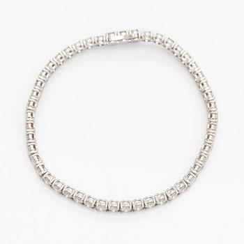 Tennis bracelet, brilliant cut diamonds, 14K white gold.