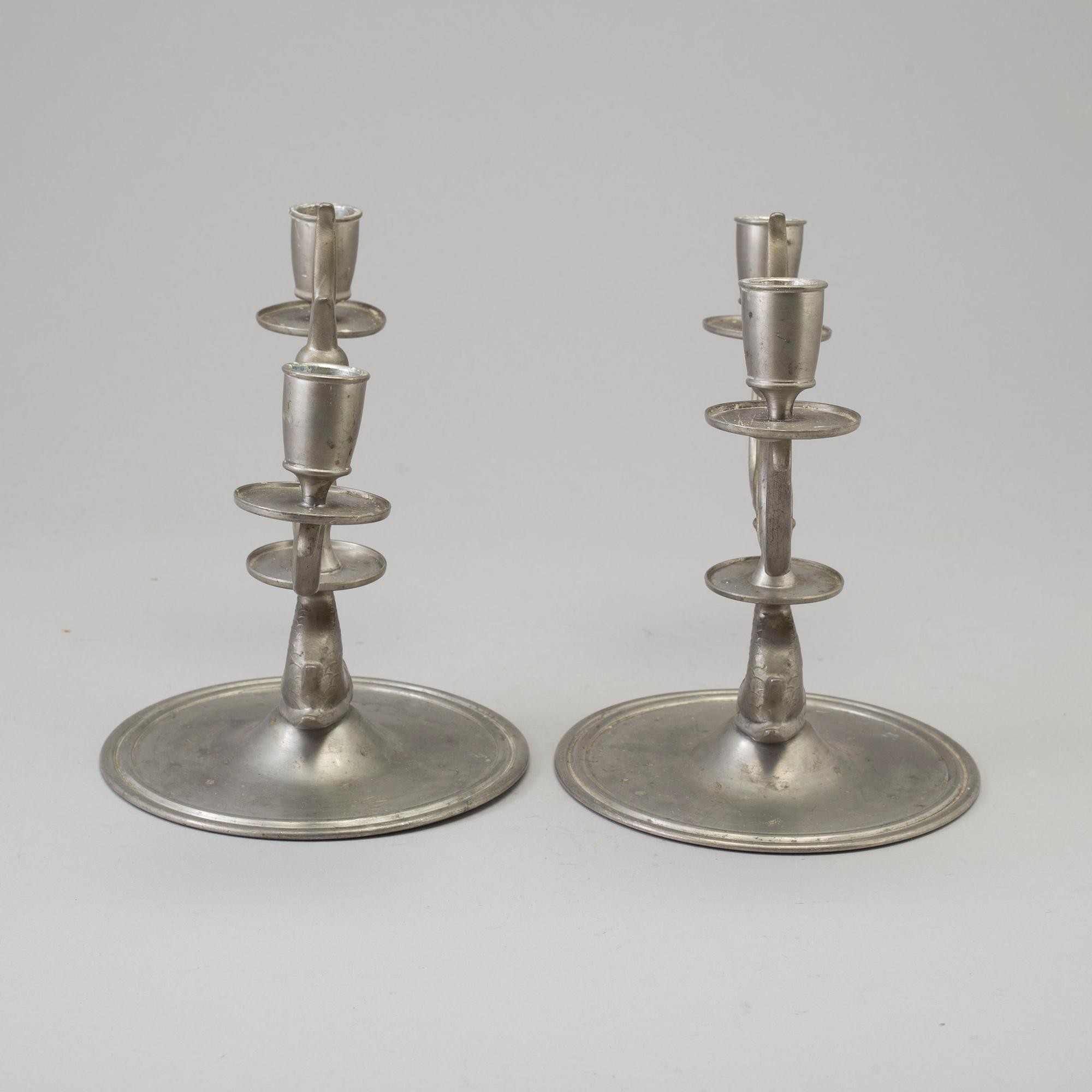 A pair of pewter chandeliers, Firma Svenskt Tenn, Stockholm 1928.