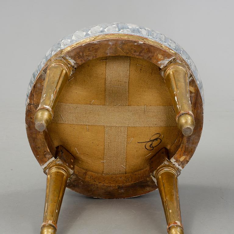 A gilded gustavian stool by E Levin.