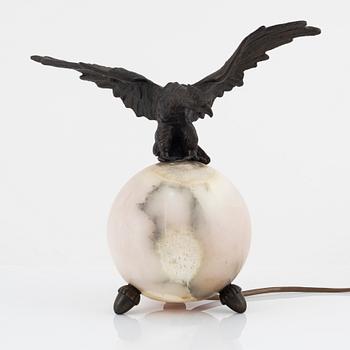 An onyx and bronze Empire style table lamp,  first half of the 20th century.