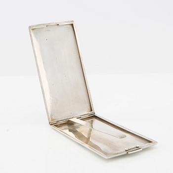 American silver cigarette case with engraving from World War II.
