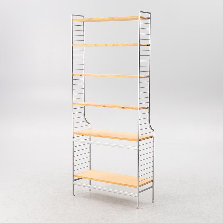 Nils Strinning, stringhylla, "Continental" 1900-talets mitt.