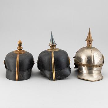 Three Swedish military helmets.