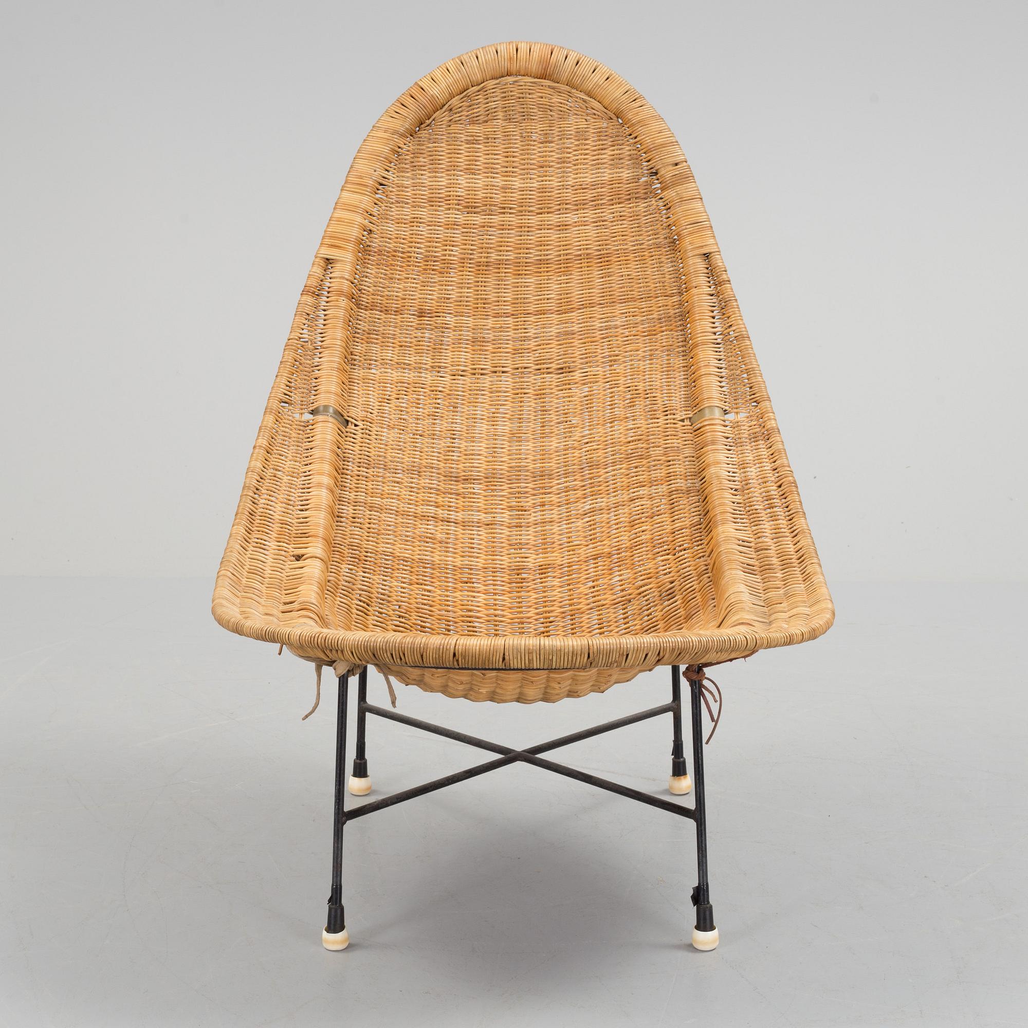 A 'Stora Kraal' rattan easy chair from Nordiska Kompaniet, 1950's.