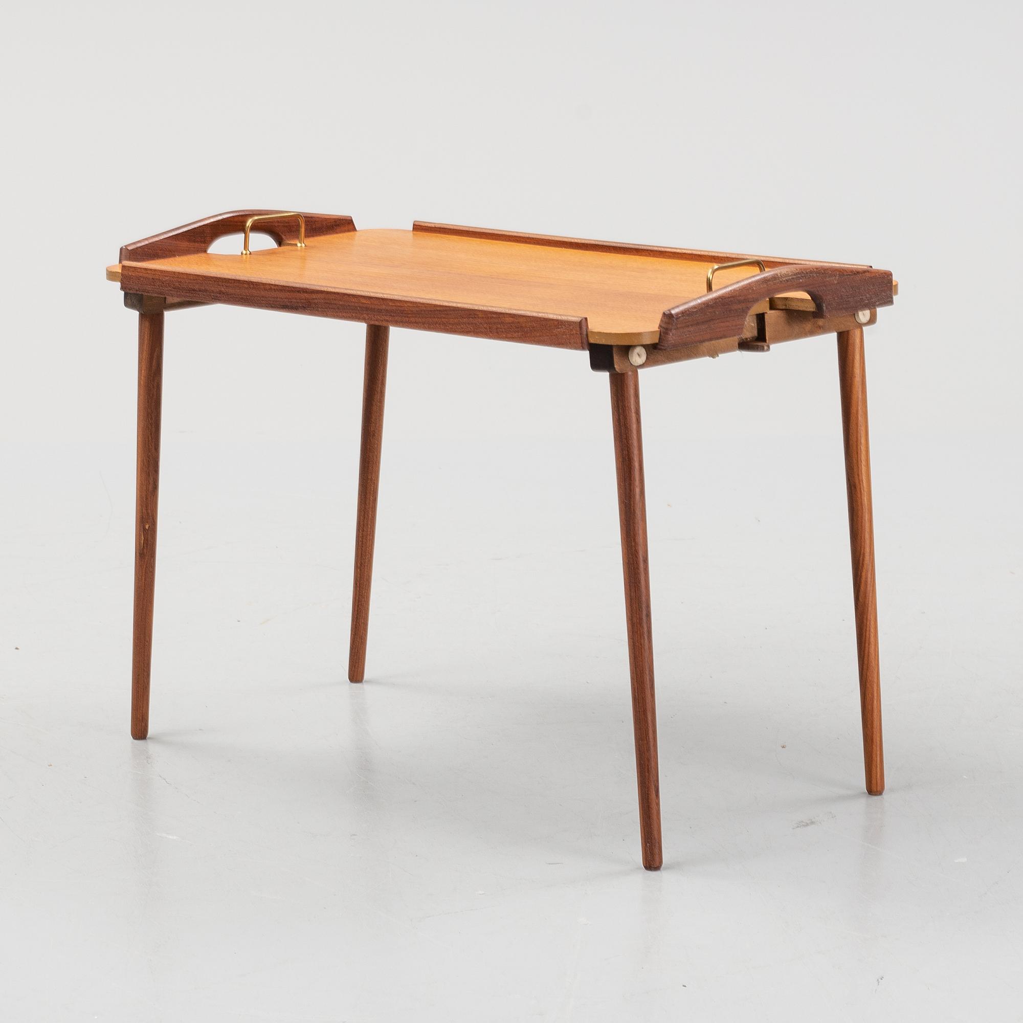 a 1950's 'Tixi' tray table by Berndt Winge for Aase Möbler, Norway.